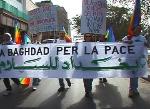 International activists, Iraqis protest Bush in large marches in Bagdad