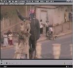 US Army puts it's flag on statue of Saddam