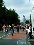 Riding with lots of public support through Whitechapel in the East End