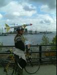 One cyclist makes his point outside ExCel while pondering his next move