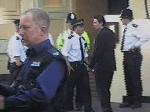 Windrush Communications employee talks to senior cop