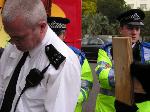 Police taking details.