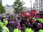 Police surrounding celebrators in Trafalgar Square.