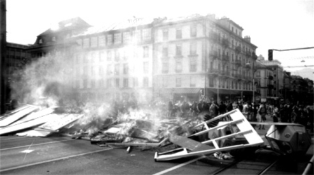 before joining the demo, the barricades get set on fire- a long lasting effect