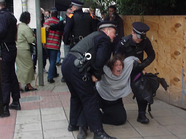 girl dragged into police cordon