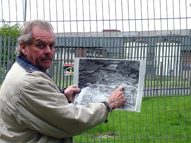Bryan Sutcliffe points to where he was exposed to asbestos contaminated soil