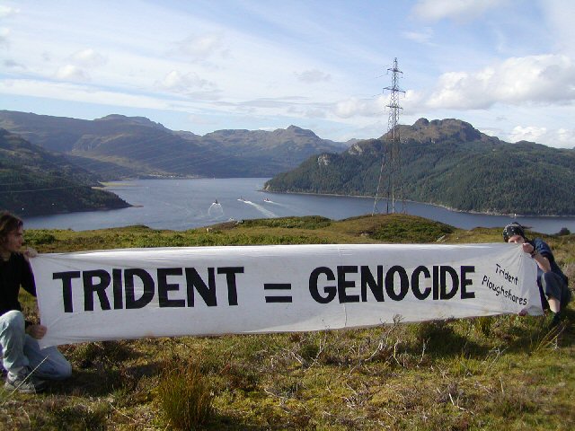 The Trident Submarine travels up Loch Goil towards the Maytime test range