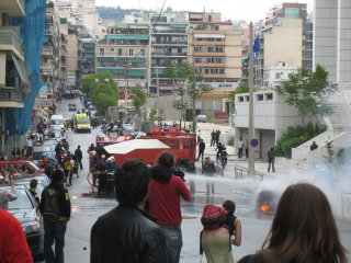 burning car near police headquarters
