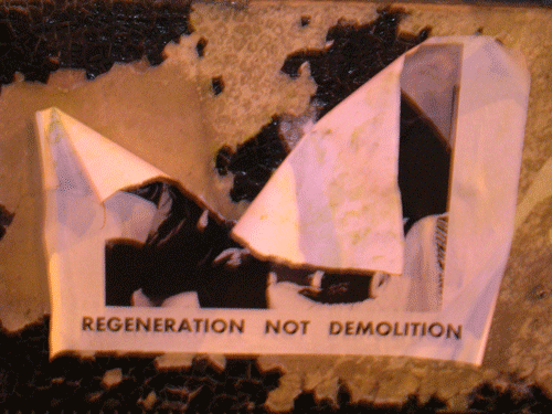 Torn Remnants of a Poster Protesting Edge Lane Demolitition