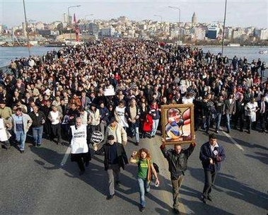 Thousands of people march on the Unkapani bridge over the Golden Horn