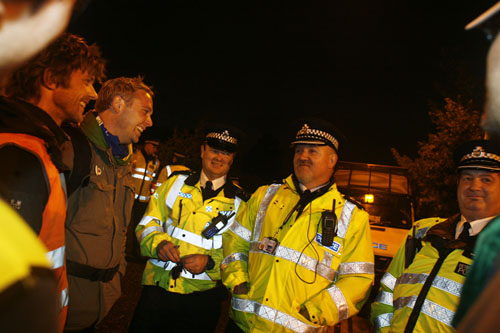 On the car park - night time. Chief of police spreading dis-information