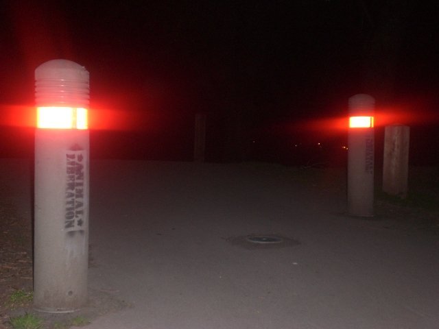 Two of the three bollards painted both sides