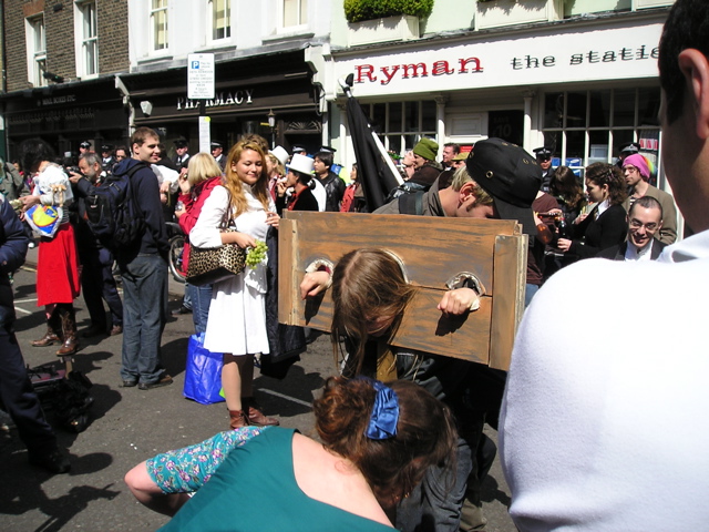 In the stocks and pelted with soft sponges.