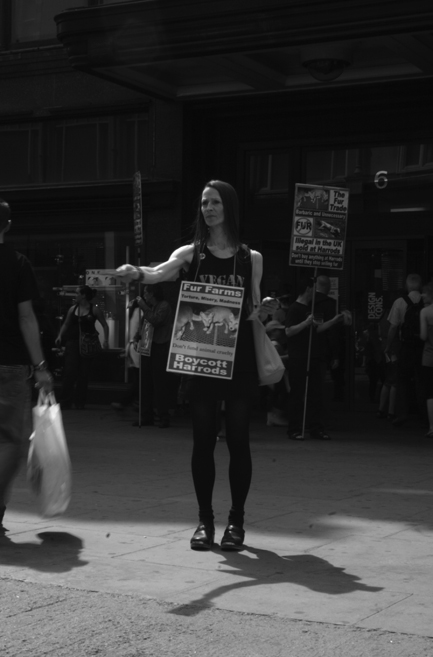 Woman handing out leaflets