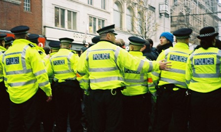 The police sandwich the protestors