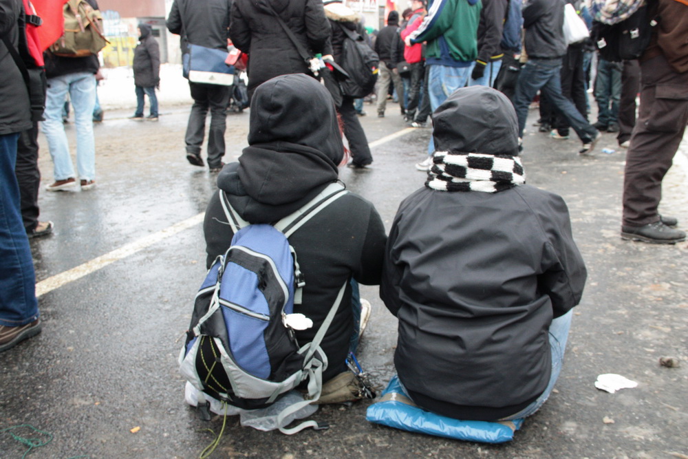 protestors sitting on the street