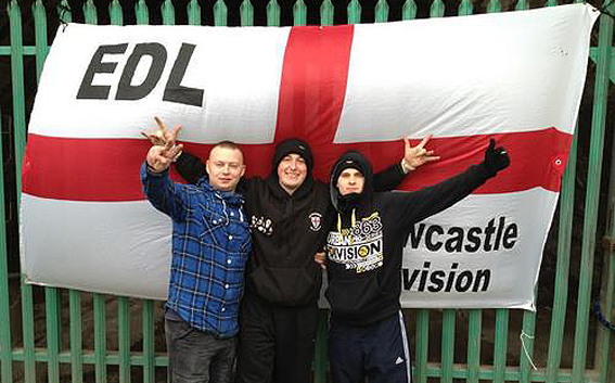 Anthony Craggs (right) posing with EDL Newcastle flag and "Urban 863 Division