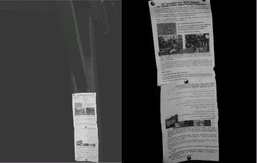 Leaflets are attached to the gate posts in four languages