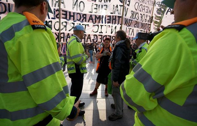 The big banner, police and legal observers.