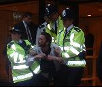 3 ARRESTED AFTER DISRUPTING ARMS FAIR DINNER