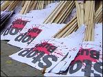 `Stop Bush` placards.