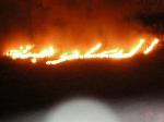'Al-Fallujah' spelt out in flames lights up the sky on Jabal Ash-shamliya, the m