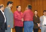 here is chavez with VENEPAL workers