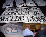"Body bag" die-in, radiation kills, submissions to the committee