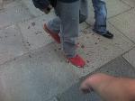 Blood, i assume, on the pavement. 2:05pm