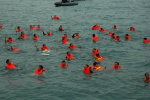korean farmers try to swim to the wto meeting