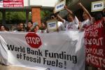 “World Bank; Hands Off”, “Carbon Trading is a Sin”, “Land Rights Now”
