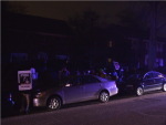What a protest at Jennifer Luray's home looks like under police lights at night
