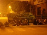sitting in front of tanks to stop the army advancing 08/02