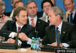 George Bush and Tony Blair attend the NATO summit in Istanbul, 28 June 2004