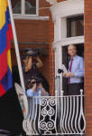 Julian Assange appears on the balcony of the Ecuadorian Embassy