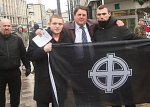 BNP chairman Nick Griffin with Fascist flag-bearers