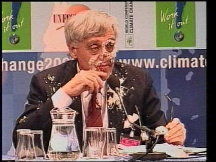 Climate change 2000 - US negotiator gets pied - shortly after