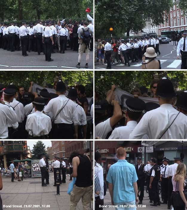 police photographers followed demonstrators after Saturday Embassy Demo, London.
