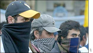 Argentina arrests police over killings