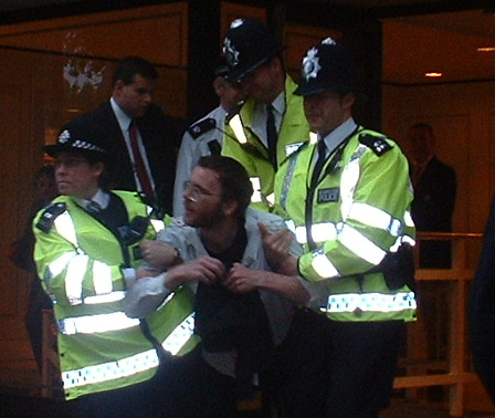 3 ARRESTED AFTER DISRUPTING ARMS FAIR DINNER