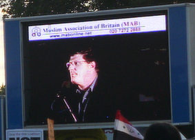 Pix of puppets and placards at peace demo