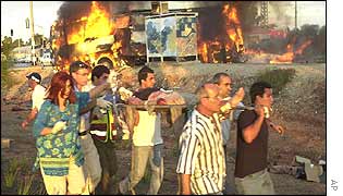 Suicide car bombers kill 14, injure 42