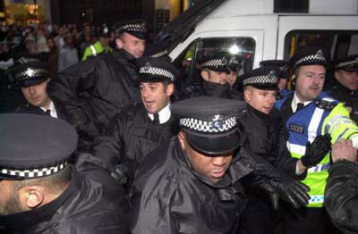 Pic Four: Police push into crowd