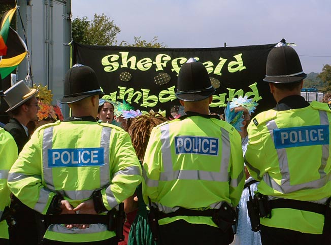 The Sheffield Samba Band immediately drew a wall of police.