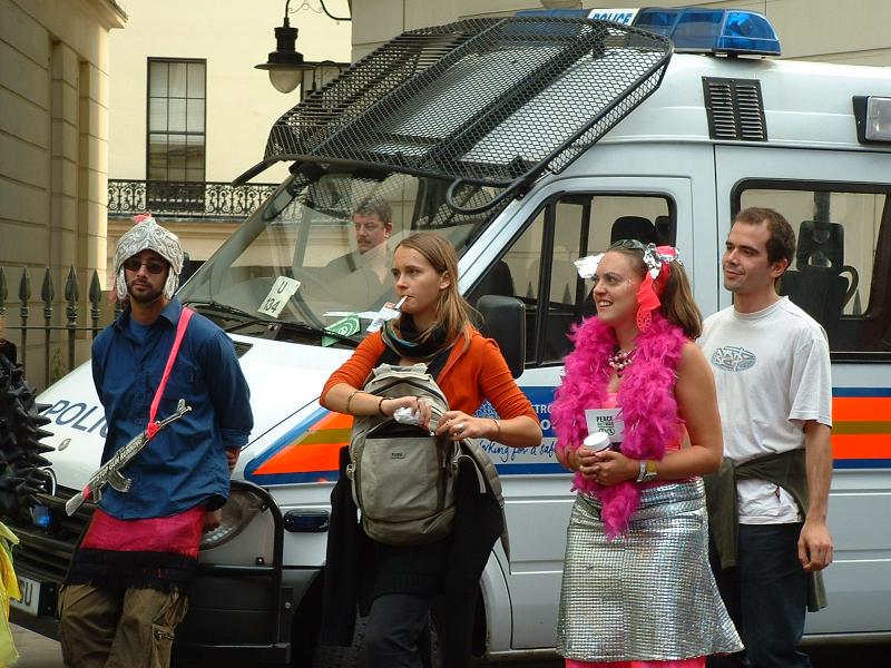 Protestors and police van