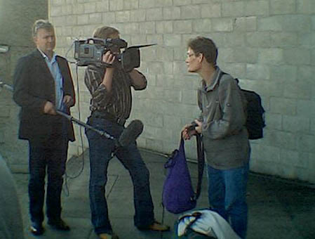 Ulla speaking to Danish film crew outside Kirkcaldy Sheriff Court