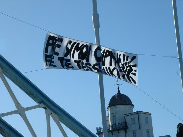 Free Simon Chapman! Free the Thessaloniki 7!