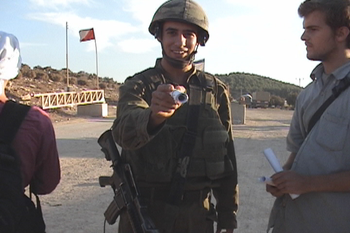The soldier with the letter in hand asking me where I am from