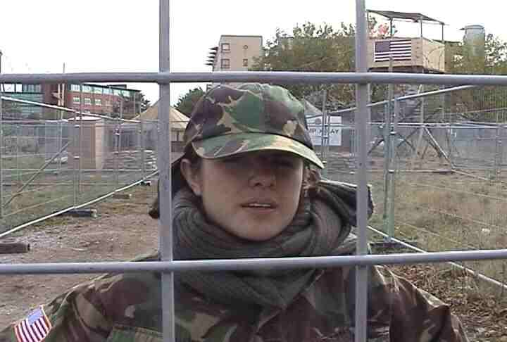 Woman camp guard being interviewed for Indymedia