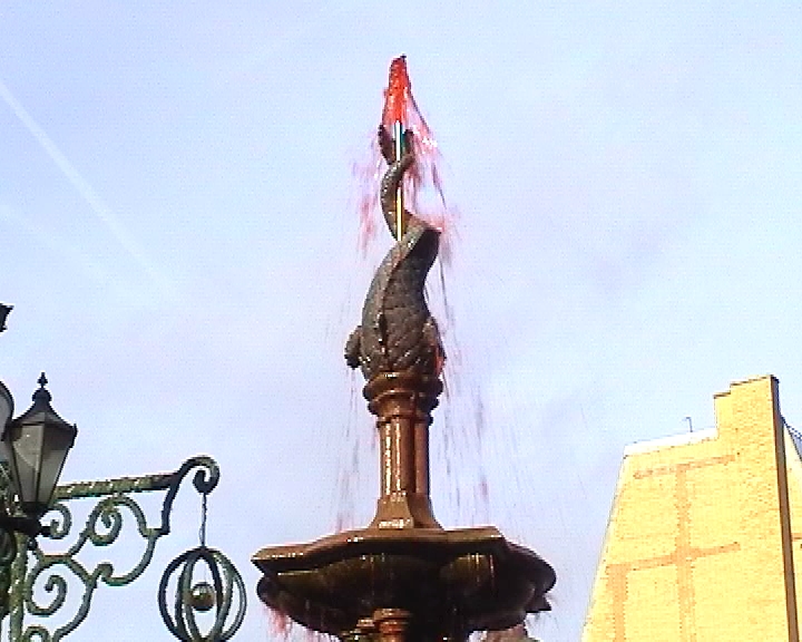 Blood red fountain in Albert Square
